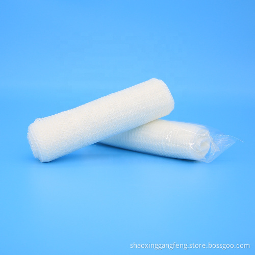 White conforming surgical dressing gauze roll bandage